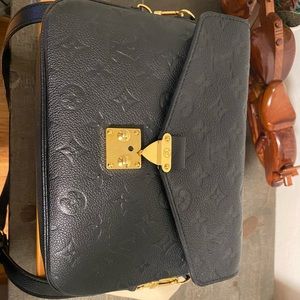 Authentic Louis Vuitton Empreinte Pochette Métis